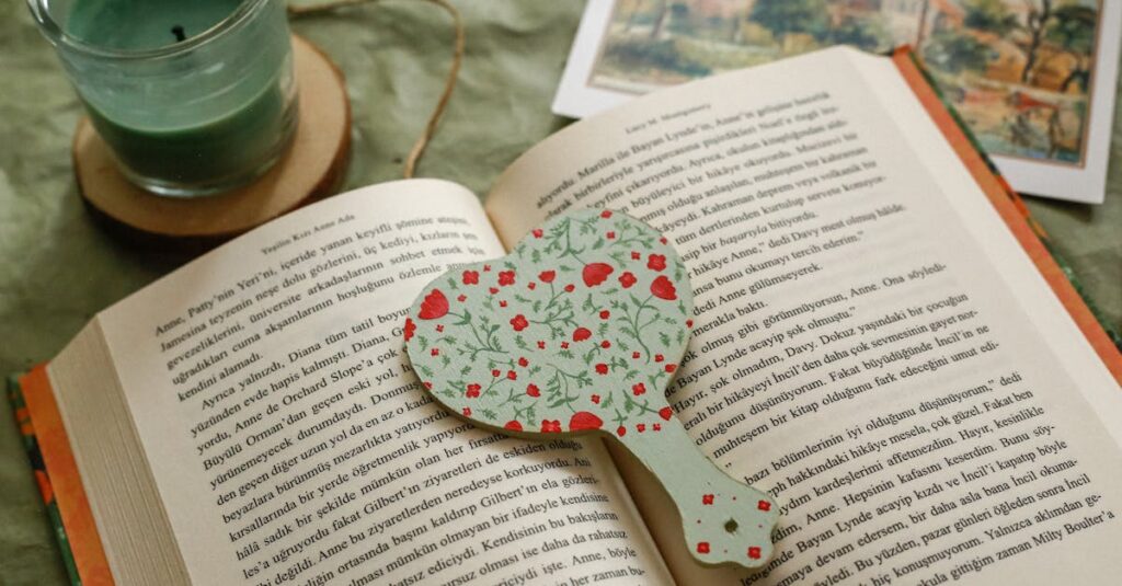๐ 5 Lifestyle Essentials Every Book Lover Needs Open book on a green cloth with heart-shaped bookmark and green candle, perfect reading ambiance.