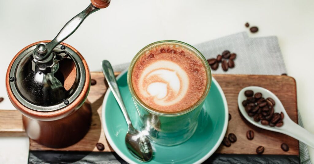 ๐ 5 Lifestyle Essentials Every Book Lover Needs A stylish coffee setup with a latte art cup, grinder, and coffee beans on a tray, perfect for coffee lovers.